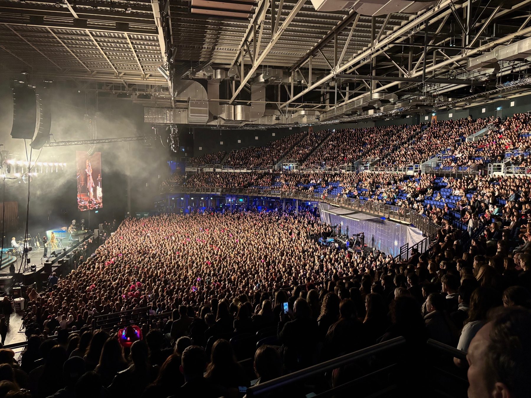 Packed arena crowd viewed from an elevated position