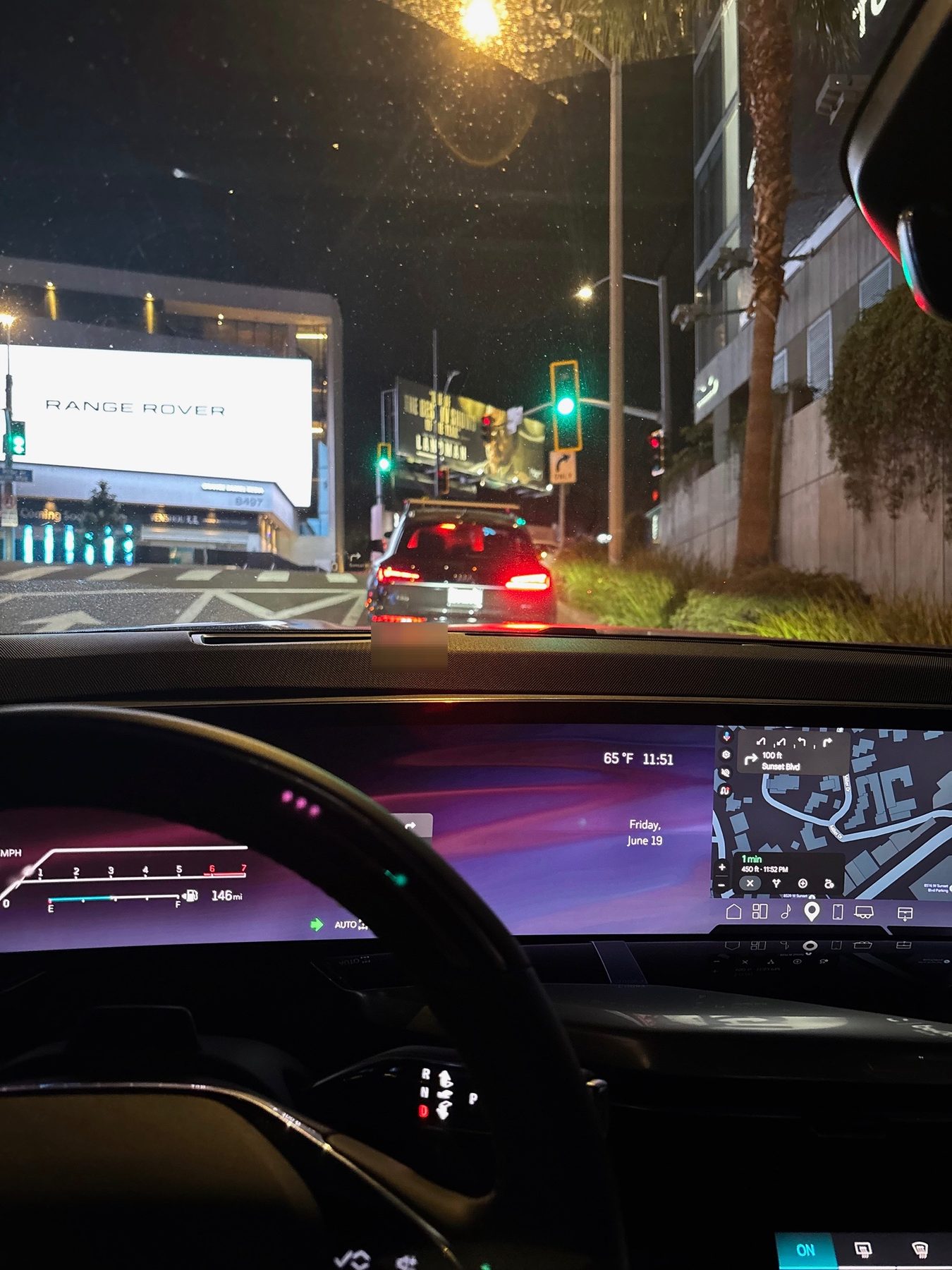 Vehicle dashboard view during a city movement